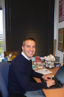 Dan at his desk.jpg